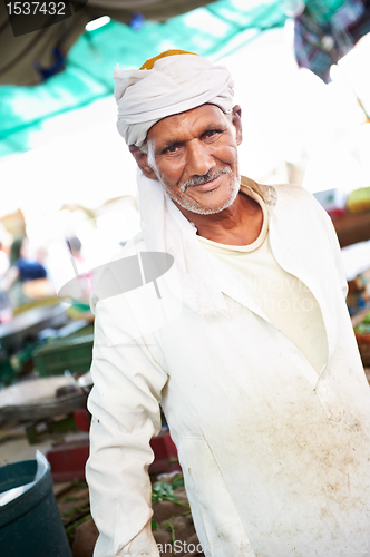 Image of arab old man at egyptian meet shop