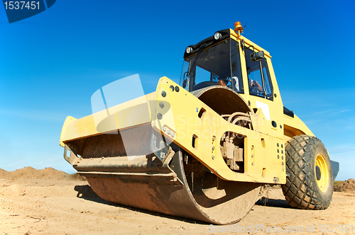 Image of Compactor at road compaction works