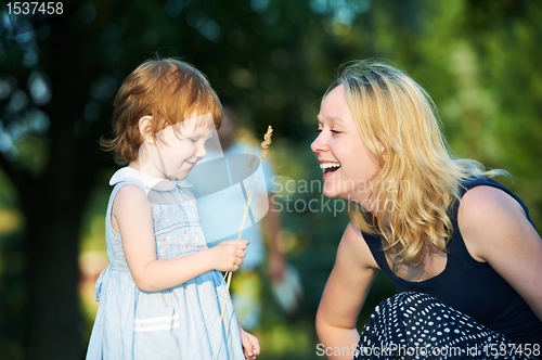 Image of mother and child outdoors