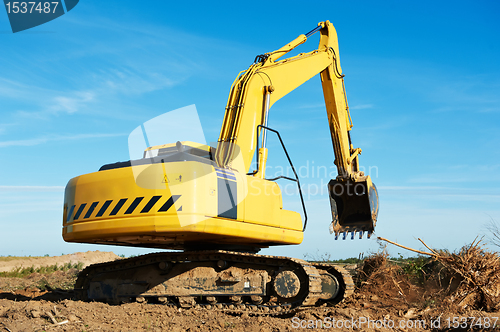 Image of excavator loader at work