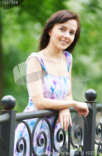 Image of Beautiful smiling girl outdoors