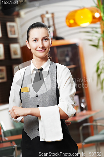 Image of Waitress girl of commercial restaurant