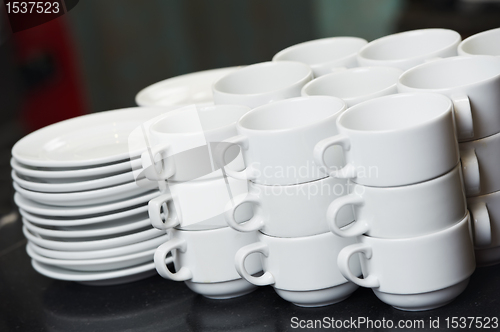 Image of clean white plates and cups