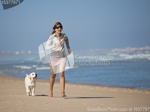 Image of Girl with her cute dog