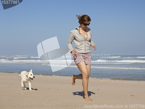Image of Girl with her cute dog