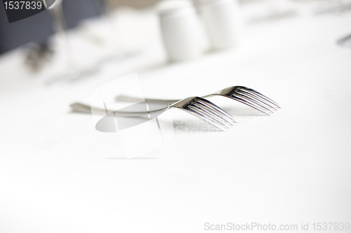 Image of forks at a table setting