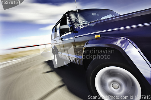 Image of moving 4x4 car