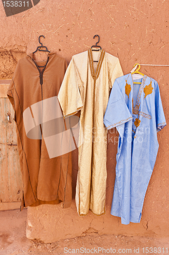 Image of Djellaba - traditional long, loose-fitting outer robe.