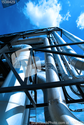 Image of Industrial zone, Steel pipelines and cables in blue tones