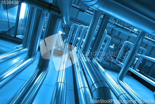 Image of Industrial zone, Steel pipelines and cables in blue tones