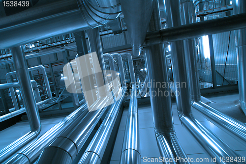 Image of Industrial zone, Steel pipelines and cables in blue tones