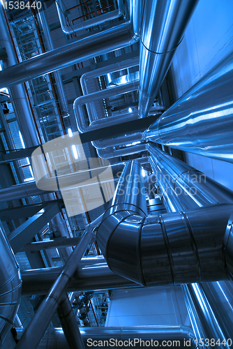 Image of Industrial zone, Steel pipelines and cables in blue tones