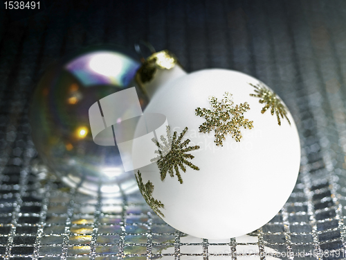 Image of ornamented white christmas bauble