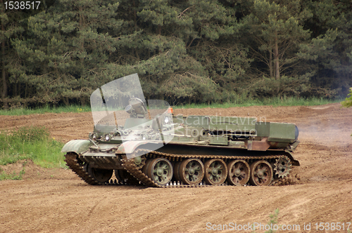 Image of offroad scenery with driving tank