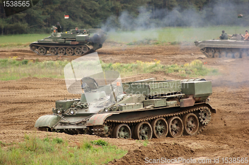 Image of offroad scenery with driving tank