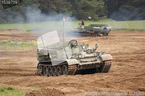 Image of offroad scenery with driving tank