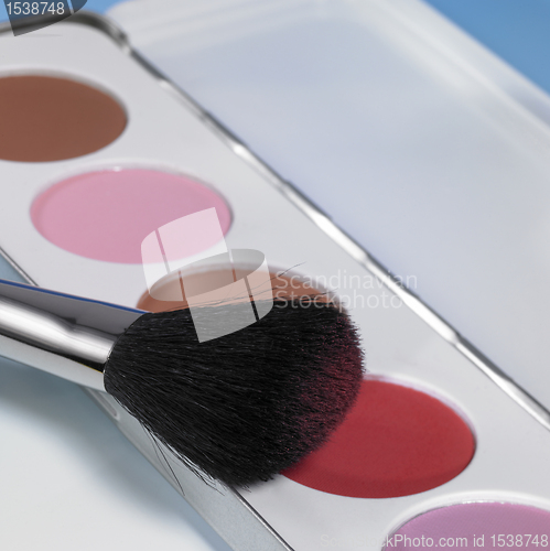 Image of make-up and brush