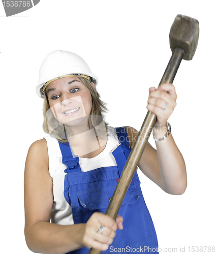Image of cute girl while hammering