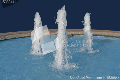 Image of three fountains in blue back