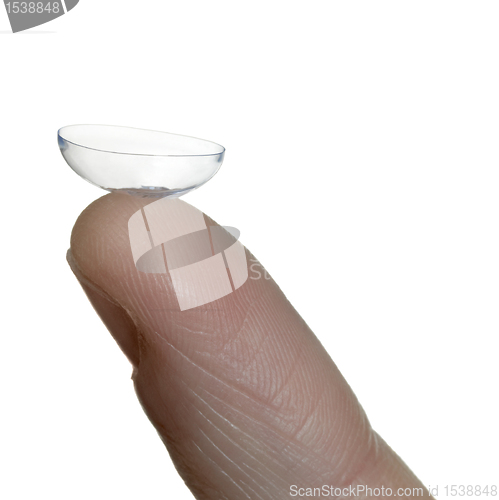 Image of contact lens on finger tip