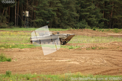 Image of offroad scenery with driving tank