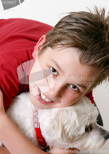 Image of Young boy and a dog