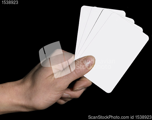 Image of hand and spread cards