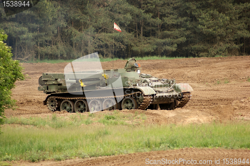 Image of offroad scenery with driving tank