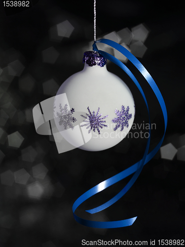 Image of Christmas bauble with blue bow