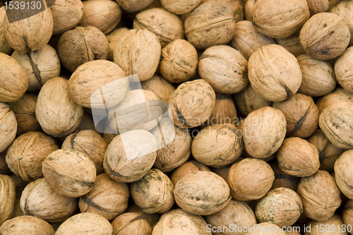 Image of unpeeled walnut background