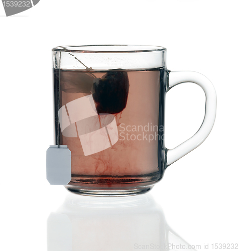 Image of glass teacup with tea bag