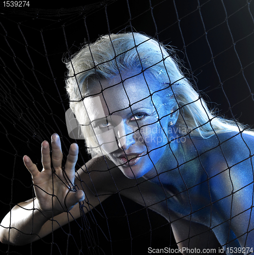 Image of blue bodypainted woman