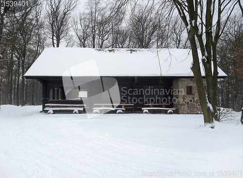 Image of cottage in winter ambiance