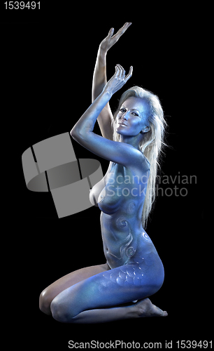 Image of blue bodypainted woman