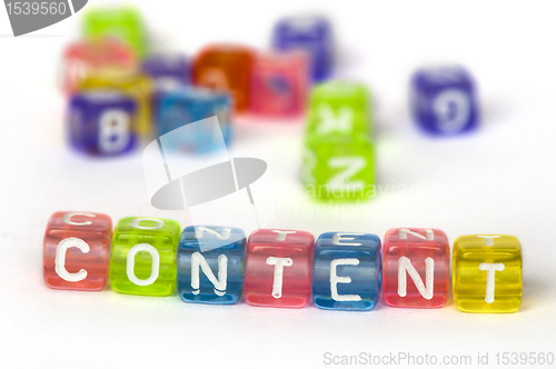 Image of Text Content on colorful wooden cubes 