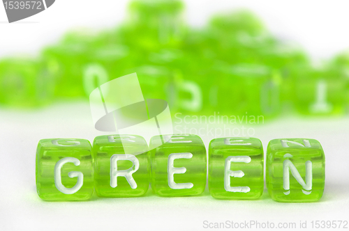 Image of Text Green on colorful cubes