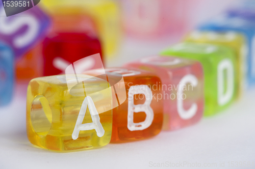Image of Text A B C on colorful wooden cubes