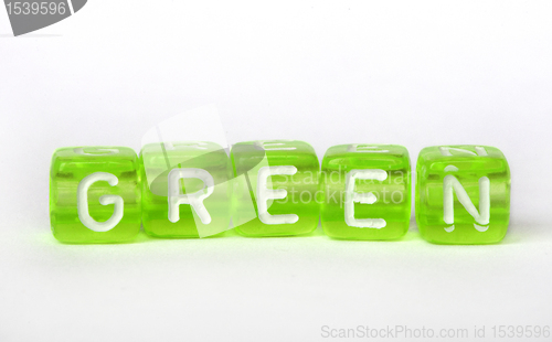 Image of Text Green on colorful cubes