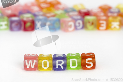 Image of Text Words on colorful cubes over white