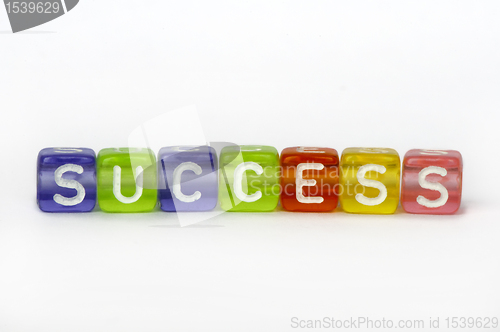 Image of Text success on colorful wooden cubes
