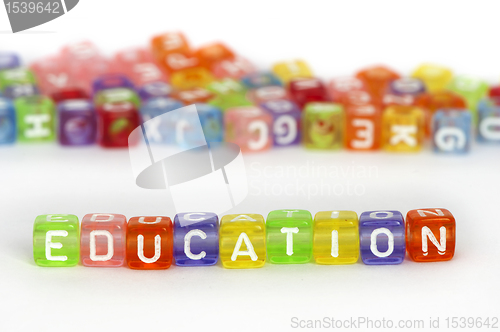 Image of Text Education on colorful wooden cubes