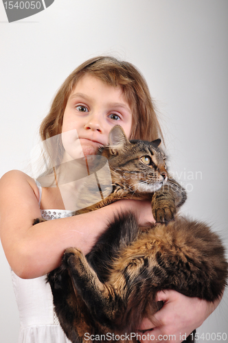 Image of chilld with a pet