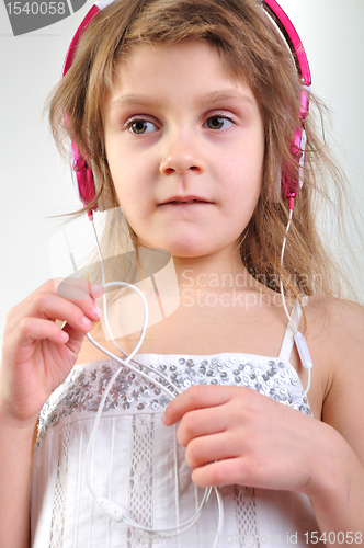 Image of child with headphones