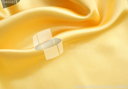 Image of Smooth elegant golden silk can use as background 