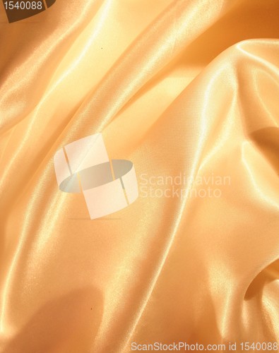 Image of Smooth elegant golden silk as background