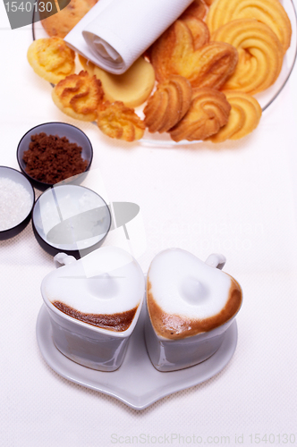 Image of heart shaped espresso coffee cappuccino cups