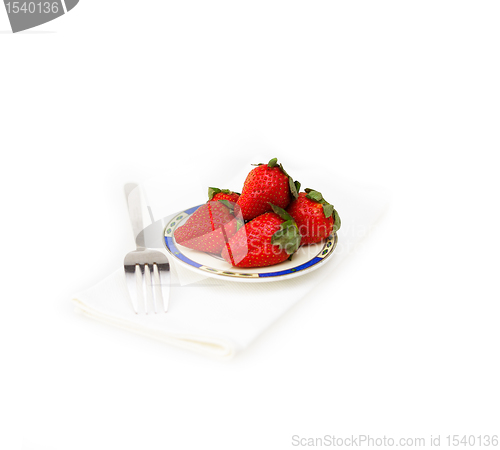 Image of fresh strawberries dish over white