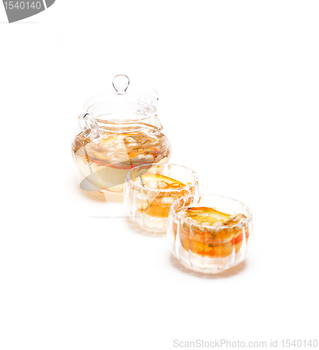 Image of floral tea set over white