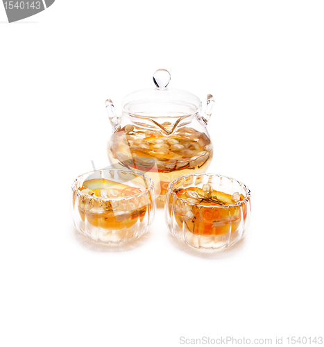 Image of floral tea set over white