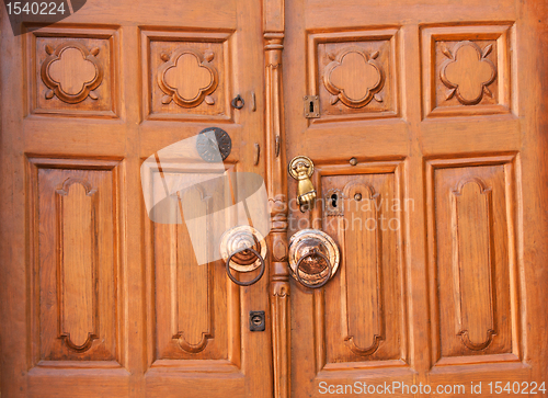 Image of Old wooden door with knocker